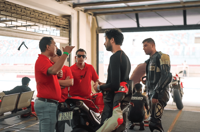 Ducati Panigale V4 S and the brand's top officials